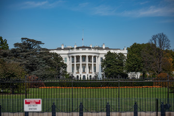 The White House, next to fence on 1600 Pennsylvania Ave.  Home of the President of the United...
