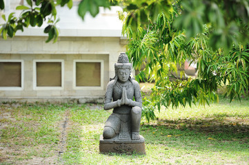 Obraz premium Ancient statue in Candi Mendut Monastery near Borobudur. Central Java, Indonesia