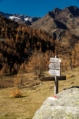 wooden sign in the mountains