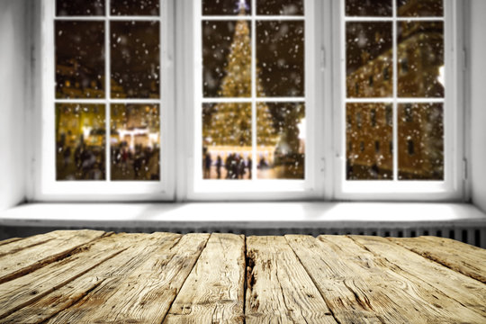 table background and window with christmas tree 