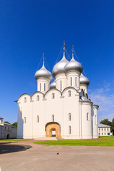 Fototapeta na wymiar Saint Sophia orthodox cathedral and church of Resurrection of Jesus, The Kremlin Square of the Old City in a sunny summer day in Vologda Kremlin.