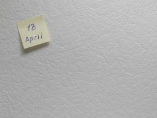 April 18, calendar date sticky note