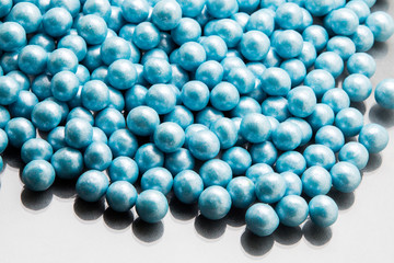 Multi-colored pearls on a white background