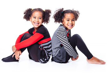 cute african american twin on white background
