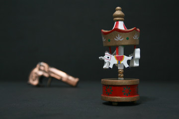 CARROUSSELL AND GUNS