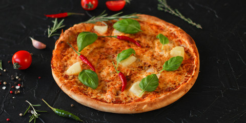 pizza, pineapple, chicken, tomato sauce, cheese, basil (pizza ingredients). Hawaiian pizza. Top view. copy space