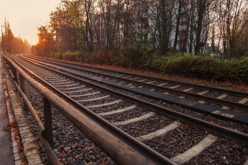Obraz na płótnie Canvas Sunrise above railways in a German city
