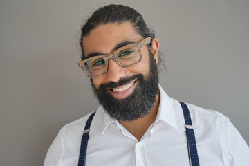 Obraz premium Portrait of hipster guy wearing suspenders, isolated