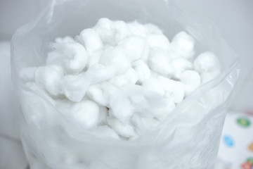 a bunch of cotton balls in a large package for medical procedures