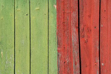 green and red painted wooden background