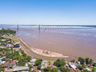 Aerial view of Encarnacion in Paraguay overlooking the bridge to Posadas in Argentina.