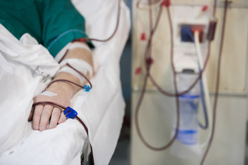 patient helped during dialysis session in hospital