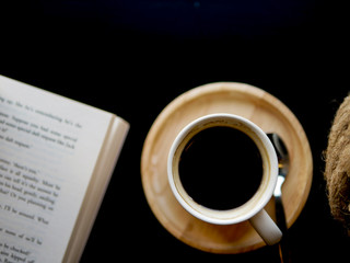 flat lay copy space over hot coffee cup with book 