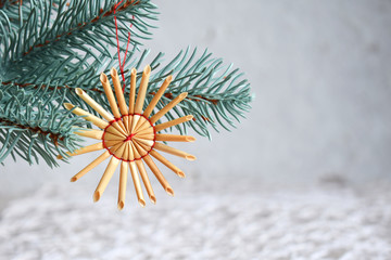 Handmade christmas toys from straw on white background. Happy New Year and Merry Christmas card