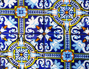 Detail of the traditional tiles from facade of old house. Decorative tiles.Valencian traditional tiles. Floral ornament.