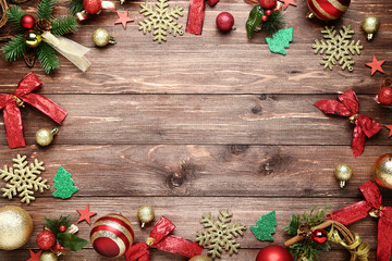 Colorful christmas decorations on brown wooden table