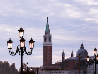 VENICE, ITALY, NOV 1st 2018: Saint Mark's or San Marco Cathedral or Basilica Domes and Bell Tower. Piazza San Marco with the Basilica of Saint Mark and the bell tower of St Mark's Campanile