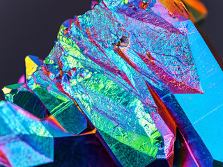 An extremely sharp and detailed Titanium rainbow aura quartz crystal cluster detail taken with a...