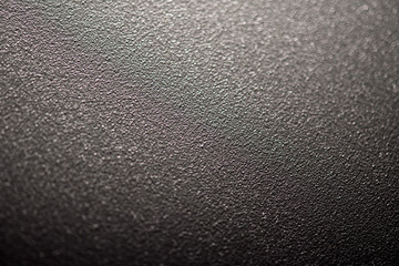 Textured surface of painted metal with powder coating. Fine texture metal surface