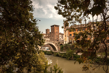 Fototapeta na wymiar Late Autumn in Rome, Italy. Roman famous Bridges over Tiber
