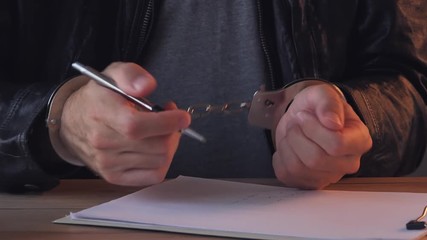 Crime suspect during an interview in police interrogation room