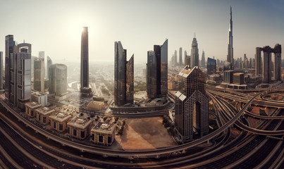 Fototapeta na wymiar Dubai skyline in the morning, panoramic aerial top view to downtown city center landmarks at sunrise. Famous viewpoint, United Arab Emirates