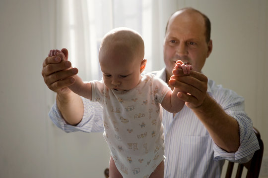 Mid-adult man and his young son.
