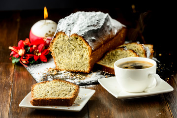 Fototapeta na wymiar cup of hot coffee and Christmas cake
