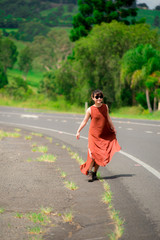 Japanese girl poses for picture in Gold Coast, Australia. Gold Coast is one of the Australia's tourist destination points.