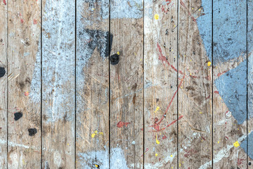 Background of an old dirty painted wooden deck.