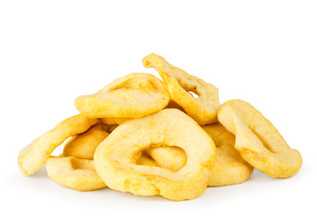 A heap of dried apples closeup on a white. Isolated.