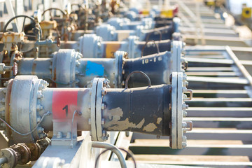 Cargo manifolds valves of an oil product tanker.