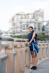 Thai girl poses for picture in Brisbane, Australia. Brisbane is one of the Australia's tourist destination points.
