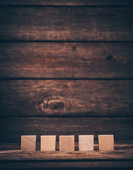 Wooden Cubes on Wood Background