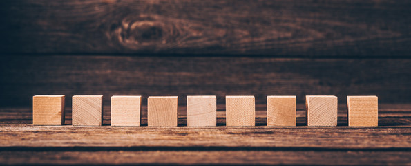 Wooden Cubes on Wood Background