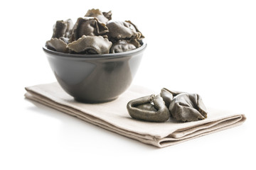 Squid ink tortellini pasta.