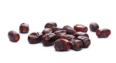 Pile dry dates isolated on white background, sweet fruit