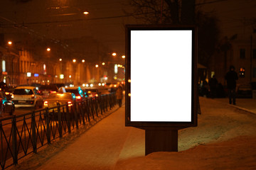 city outdoor billboard mockup Glows in the darkness of the night city winter.