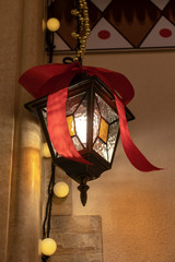 Vintage hanging on chain lantern, lamp with holiday decoration