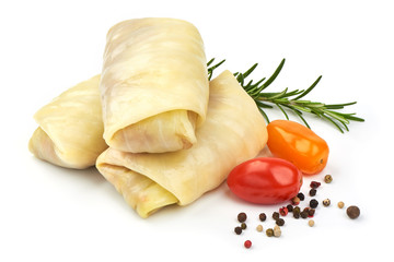 Homemade cabbage rolls with herbs and spices, isolated on a white background. Close-up