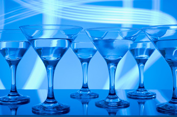 alcoholic glass in the club entourage, copy space, red background