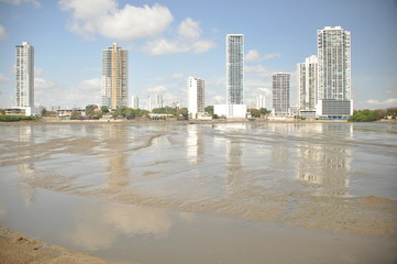 Panama city with high skyscrapers and port on the Pacific coast