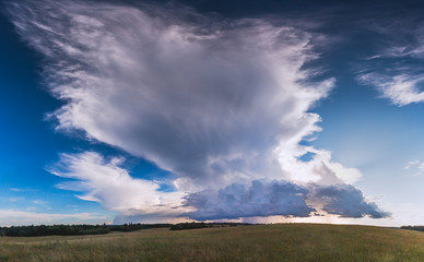 Fototapeta na wymiar Panoramic image of Cumulonimbus storm clouds at summer