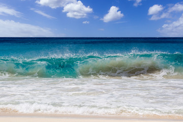 Fototapeta na wymiar Stormy water in Caribbean sea. Sandy wave