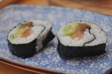 Sushi. Delicious meal with fish, rice and supplements, prepared at home.