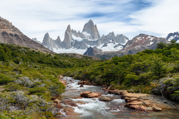 Fototapeta na wymiar View of the Fitz Roy mountain range from a river in Los Glaciares National Park, Patagonia, El Chaltén, Argentina