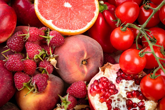 Tray With Fresh Red Vegetables And Fruits. Healthy Eating Vegetarian Concept. Close Up.