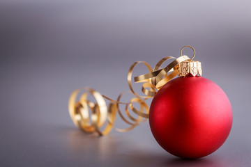 Christmas composition of Christmas tree toys on a blurred silver background