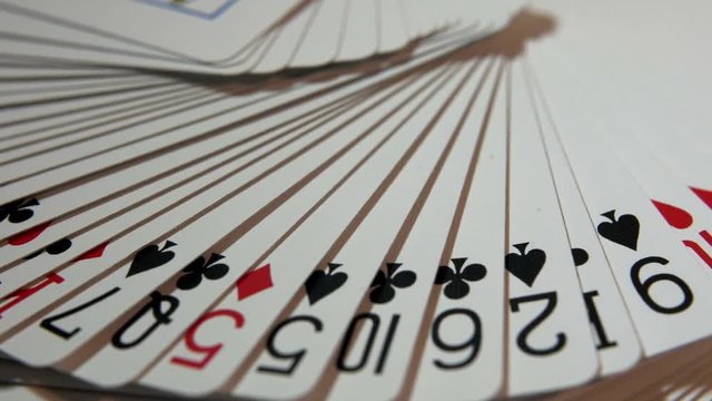 Dolly shot of Fanned deck of cards