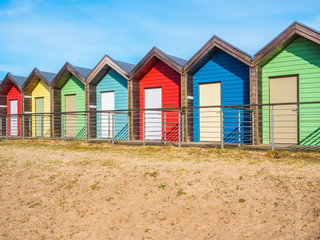 Fototapeta na wymiar Colourful Beach Huts At Blyth, Northumberland